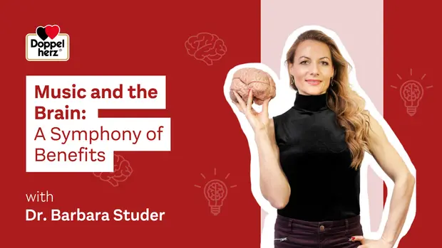 Billedet viser Dr. Barbara Studer, som holder en model af en hjerne. Teksten fremhæver emnet "Musik og hjernen: En symfoni af fordele". Baggrunden er rød med illustrationer af hjerner og glødepærer, der symboliserer idéer og indsigt.