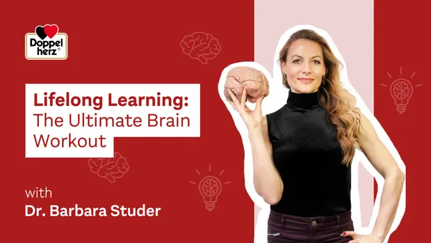 Billede af Dr. Barbara Studer, der holder en hjerne i hånden. Der er tekst, der siger "Lifelong Learning: The Ultimate Brain Workout". Baggrunden er rød, og der er illustrationer af hjerner og pærer, der symboliserer læring og forståelse.